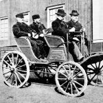 Vabis A-car from 1897. The first Swedish made car. It was constructed by Vabis' engineer Gustaf Erikson who sits beside the driver. The driver is the MD at Vabis, Peter Peterson.