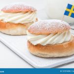 traditional-swedish-dessert-semla-also-called-shrove-bun-almond-paste-whipped-cream-filling-served-milk-traditional-157974490-1977038877